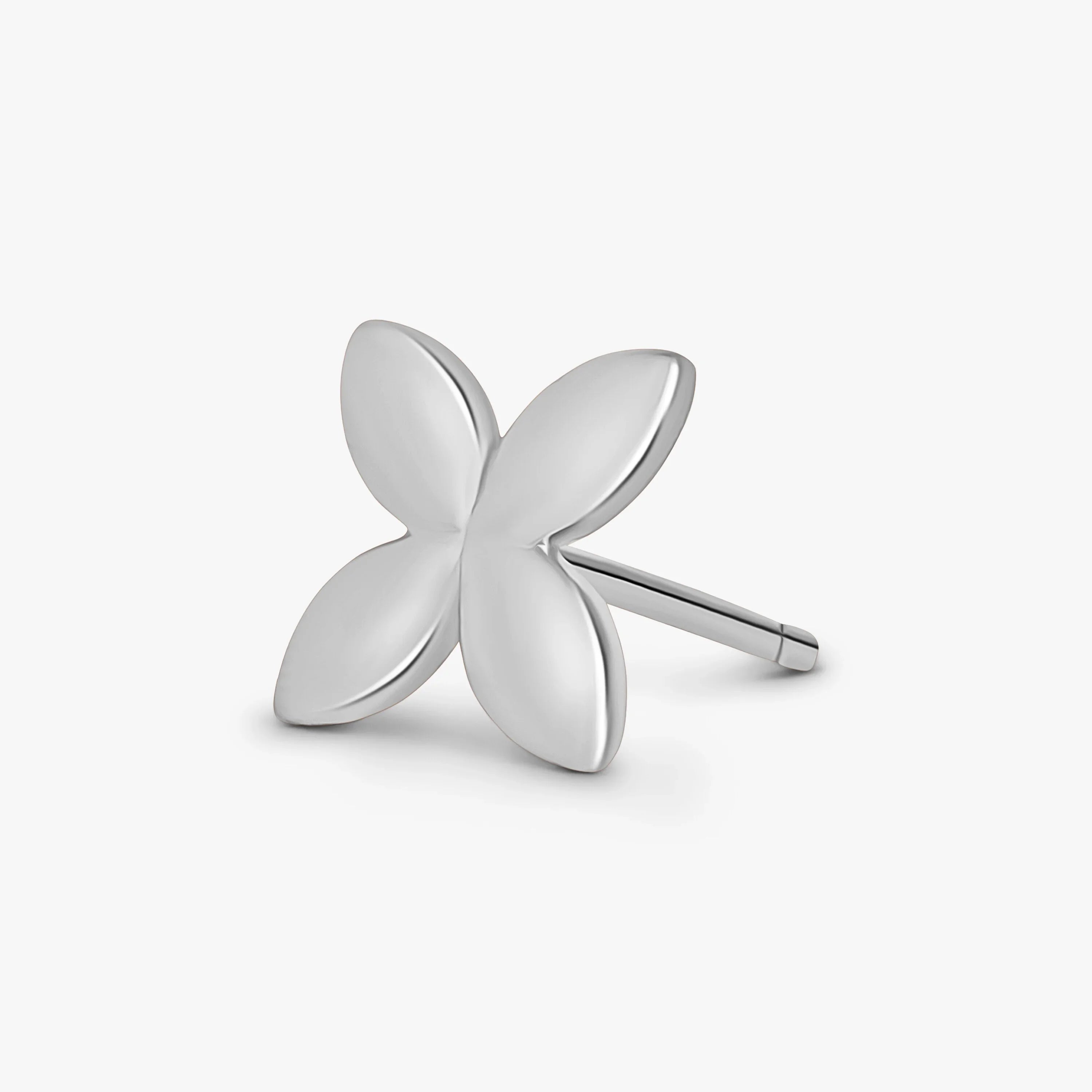 Silver flower-shaped stud earring with four smooth petals on white background