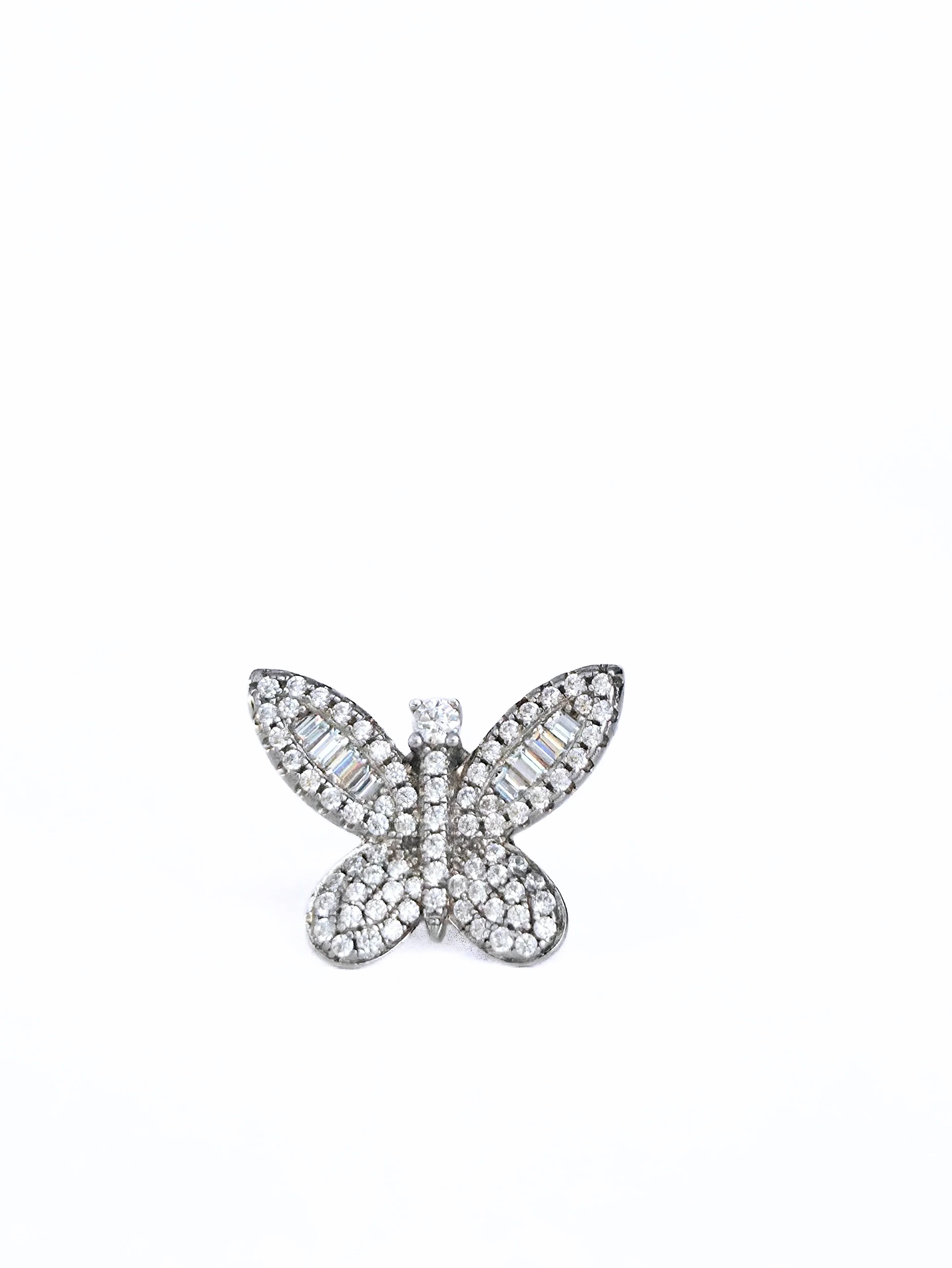 Butterfly-shaped jewelry piece with gemstones on a white background- front- shimmering butterfly earrings silver