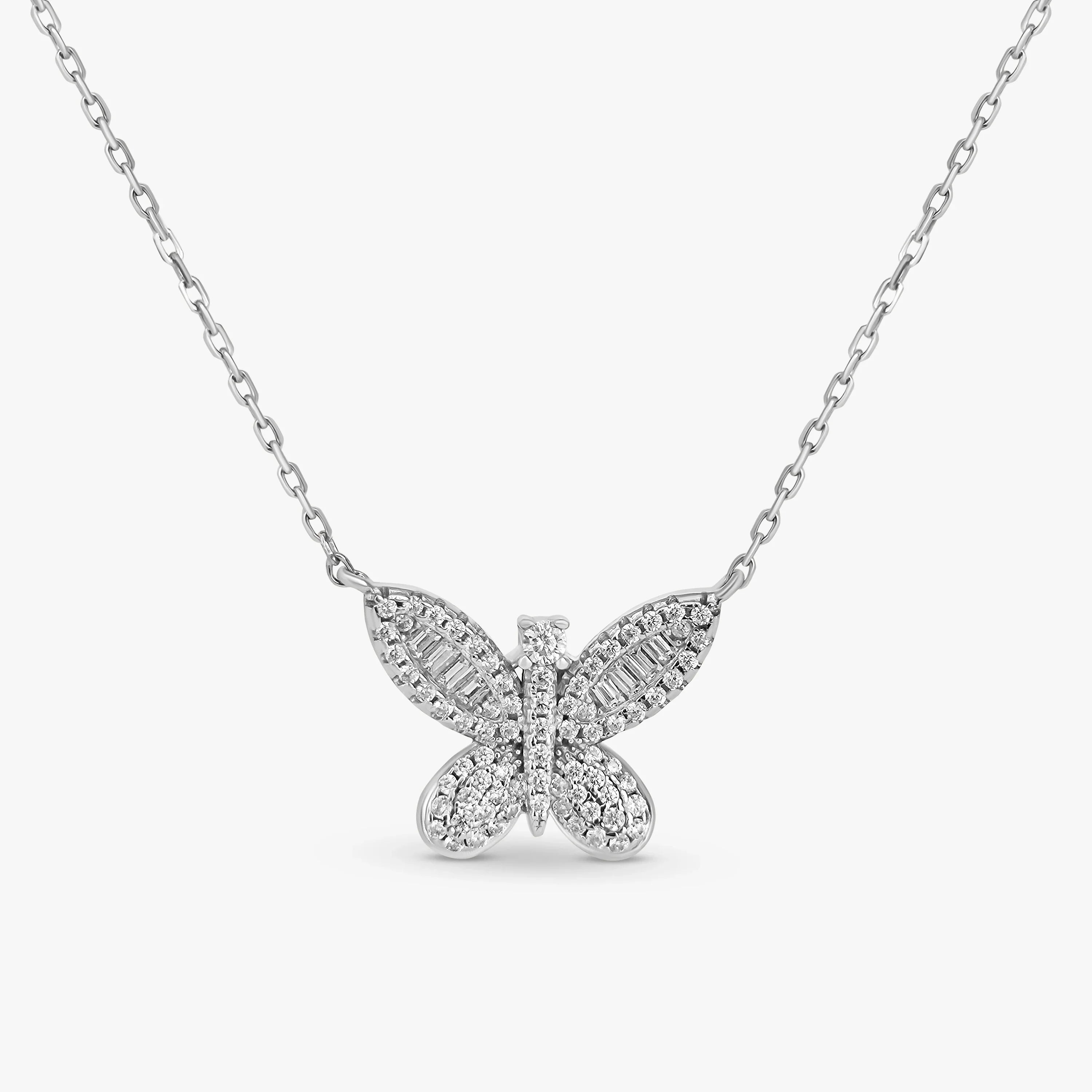 Silver butterfly pendant necklace adorned with sparkling crystals on delicate chain