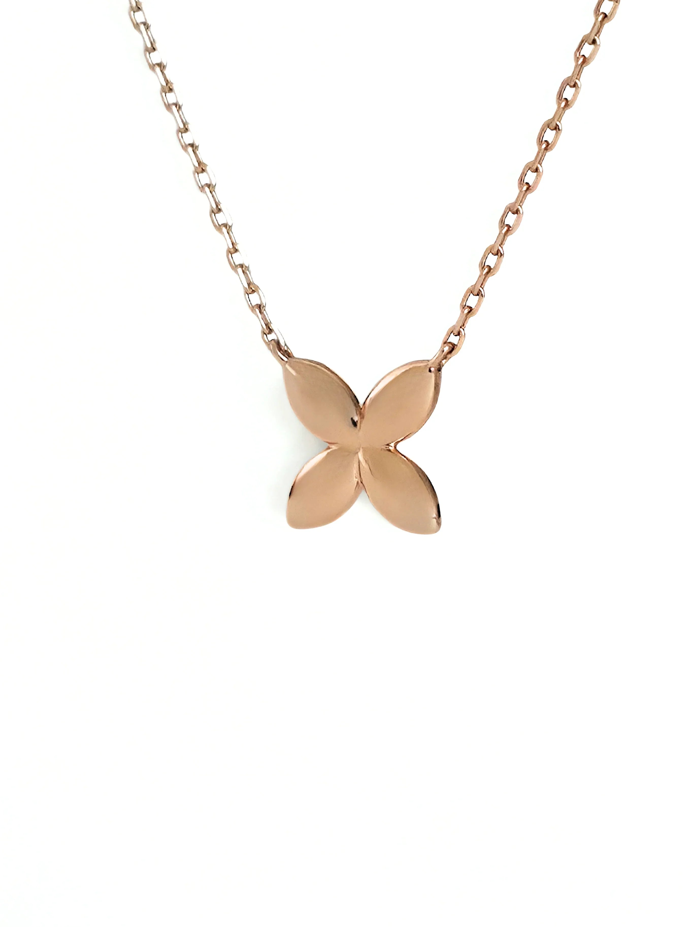 Rose gold butterfly necklace on a white background- front -side