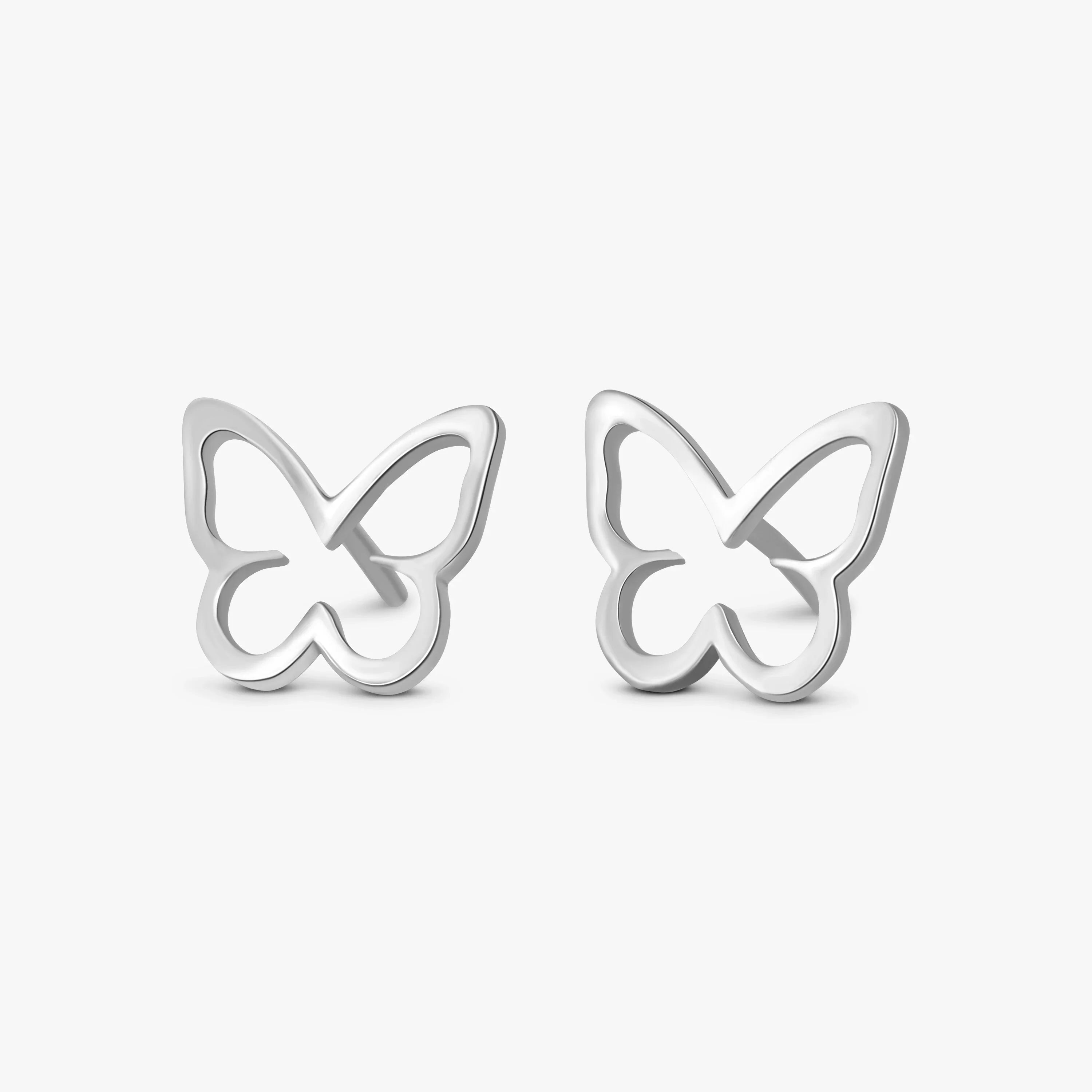 Pair of silver butterfly-shaped stud earrings on white background from Marwa Jewels
