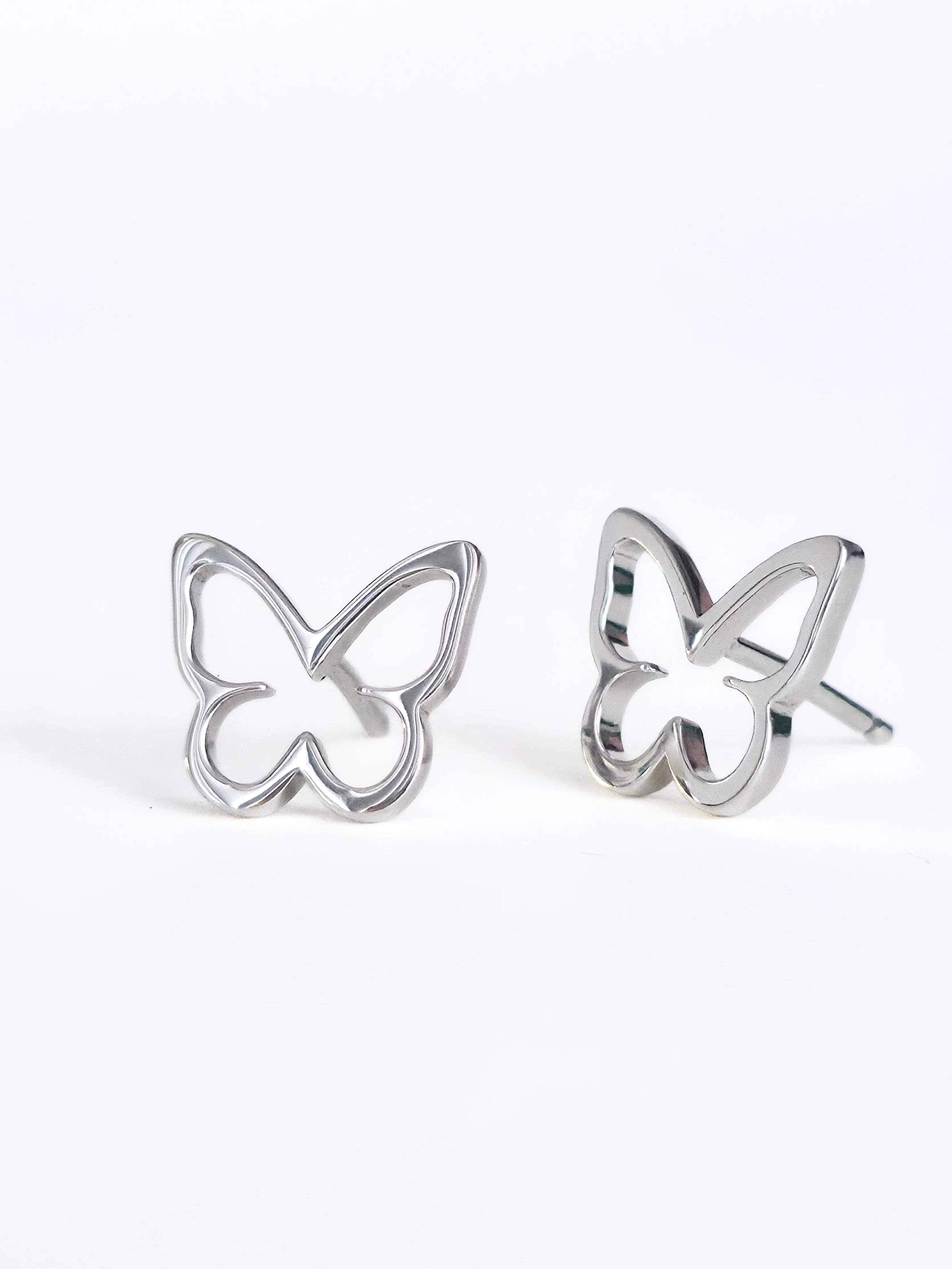 Open butterfly earrings- silver- pair