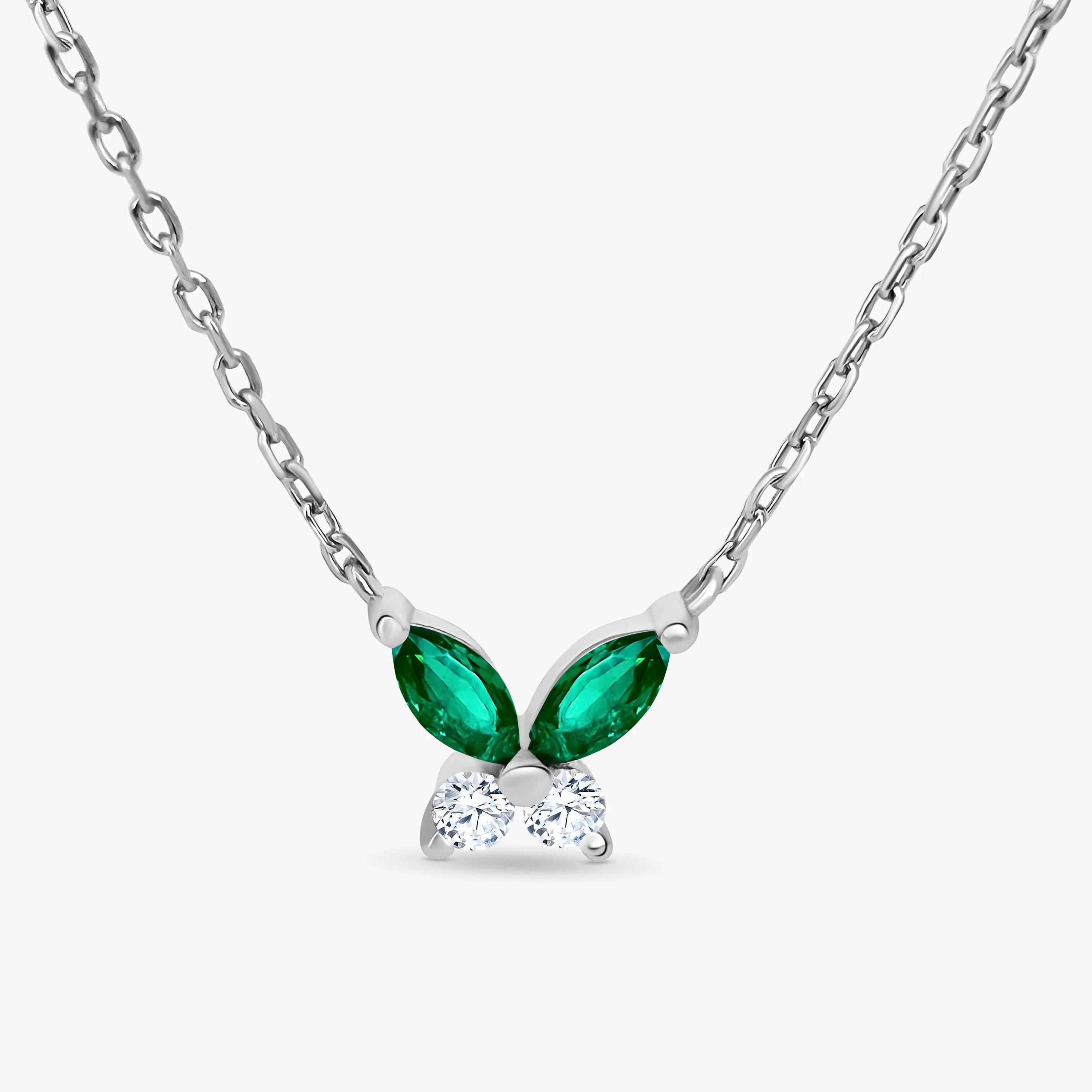 Silver necklace with marquise-cut green gemstones and round clear stones pendant from Marwa Jewels