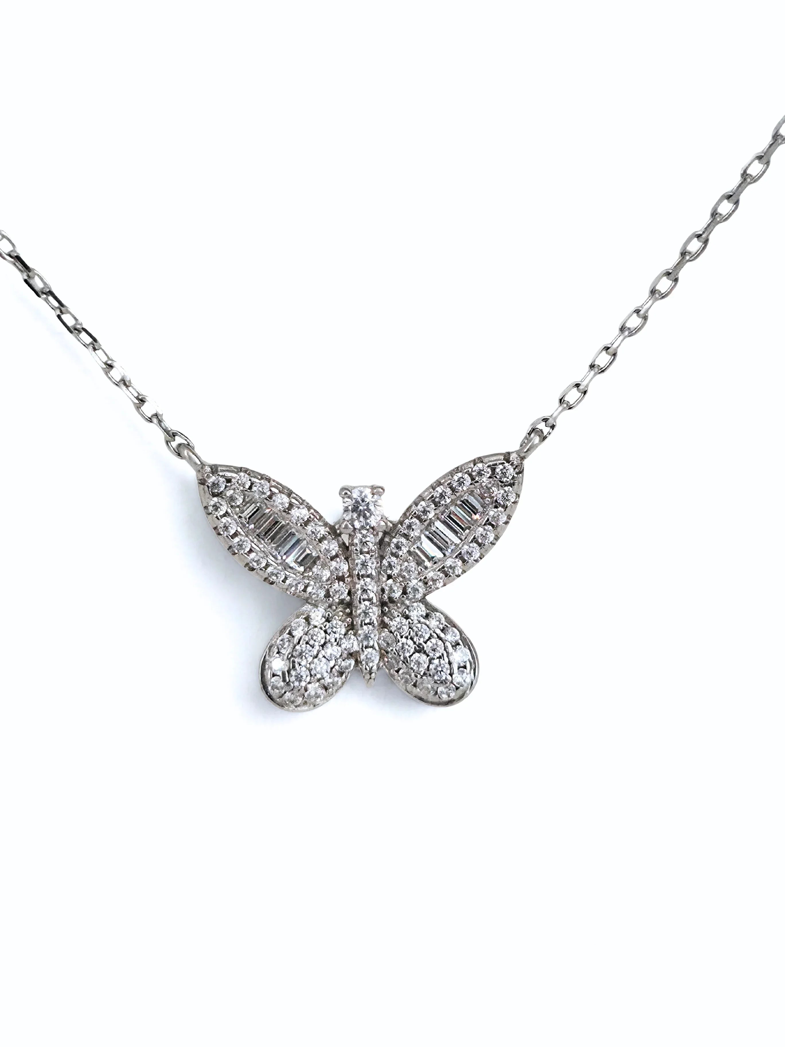 Butterfly-shaped diamond necklace on a white background- shimmering butterfly silver- further