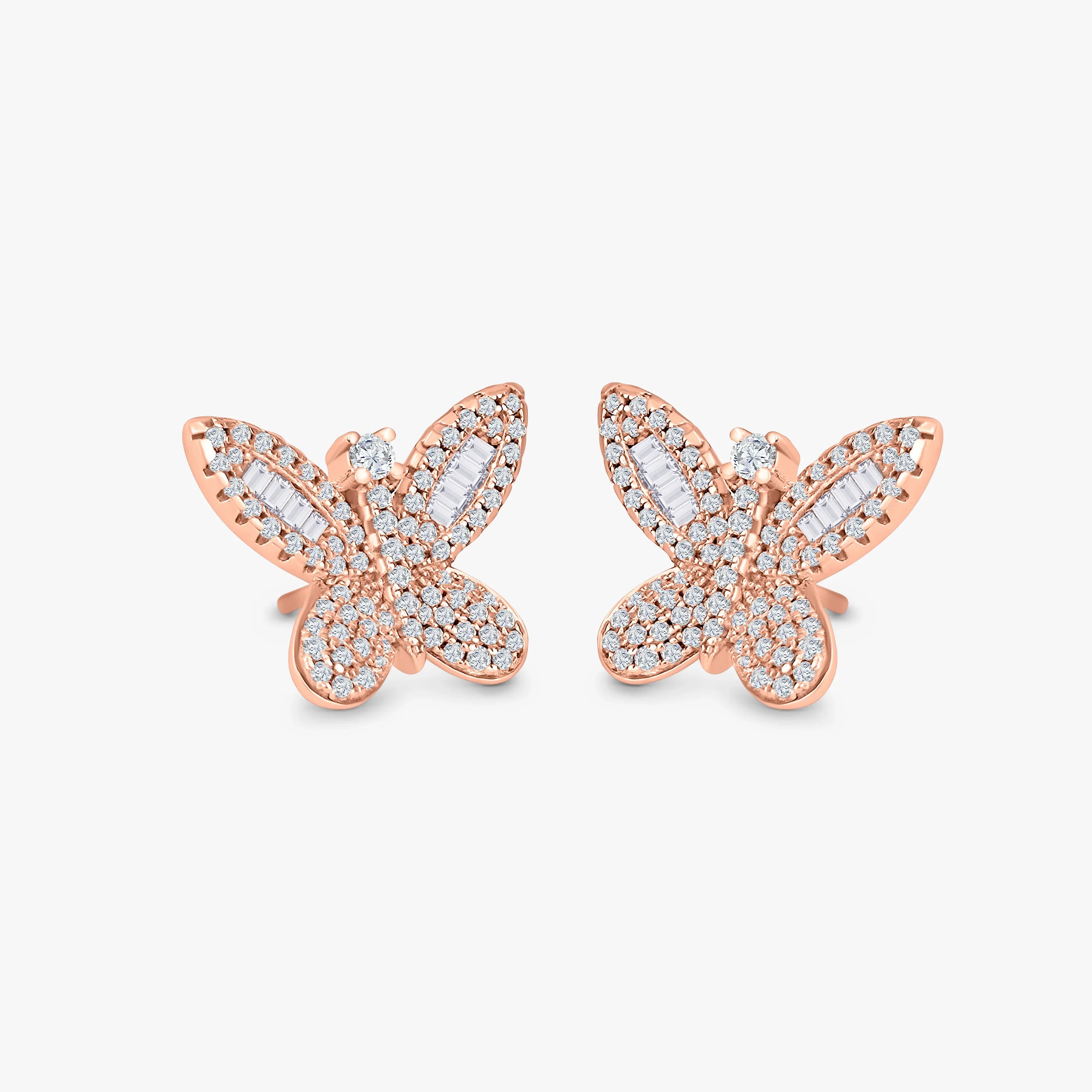 Rose gold butterfly stud earrings with sparkling clear crystals on white background