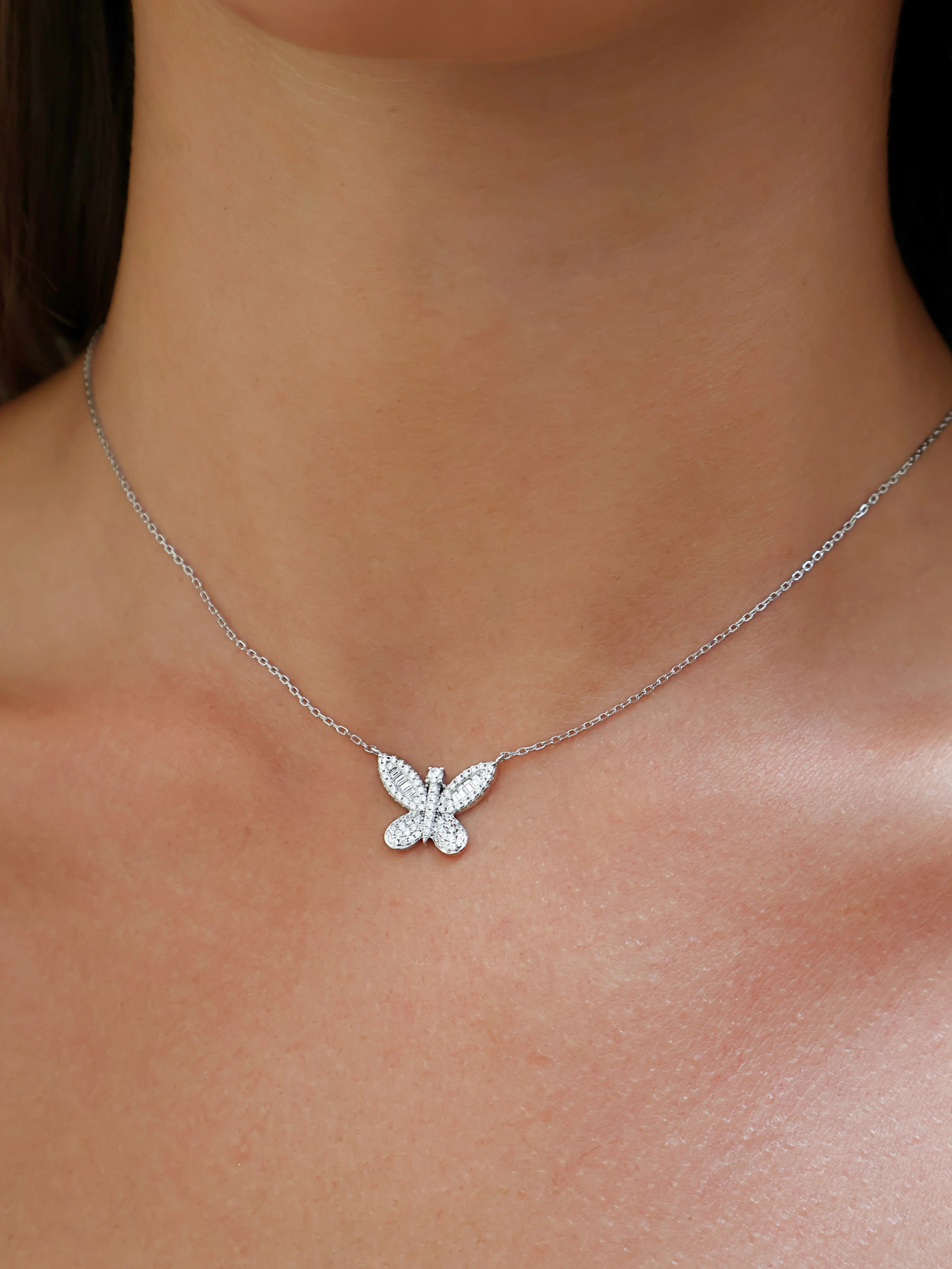 silver butterfly pendant necklace with sparkling clear crystals from Marwa Jewels