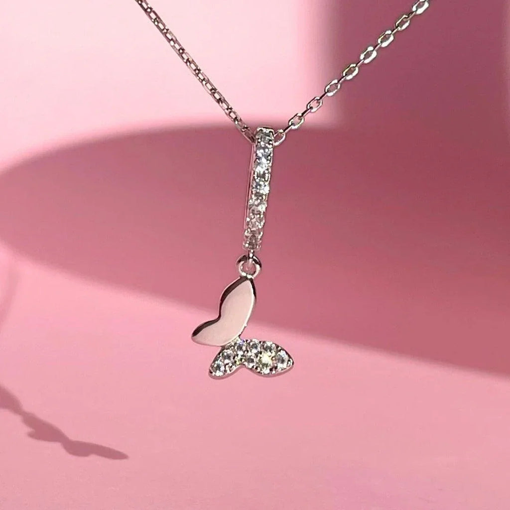 Chic Butterfly Huggie Drop Earrings | Silver - Marwa Jewels, close up