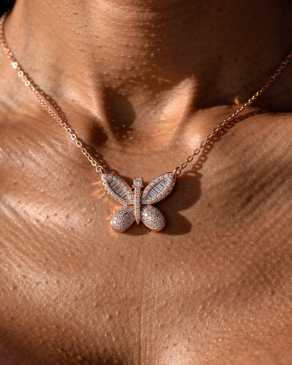 Butterfly-shaped necklace on a person's neck