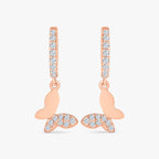 Rose gold hoop earrings with butterfly charms adorned with sparkling cubic zirconia stones
