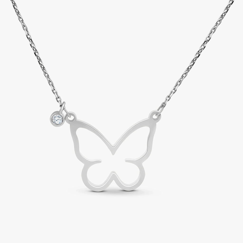 Silver butterfly pendant necklace with a small clear gemstone accent on delicate chain